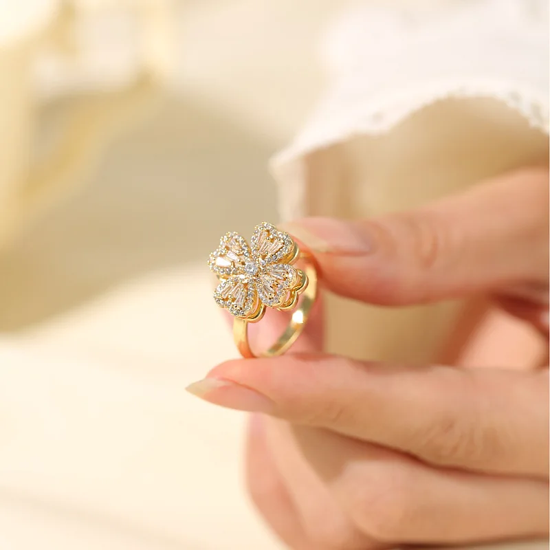 Fashion light luxury rotatable four-leaf flower opening adjustable love heart ring for women