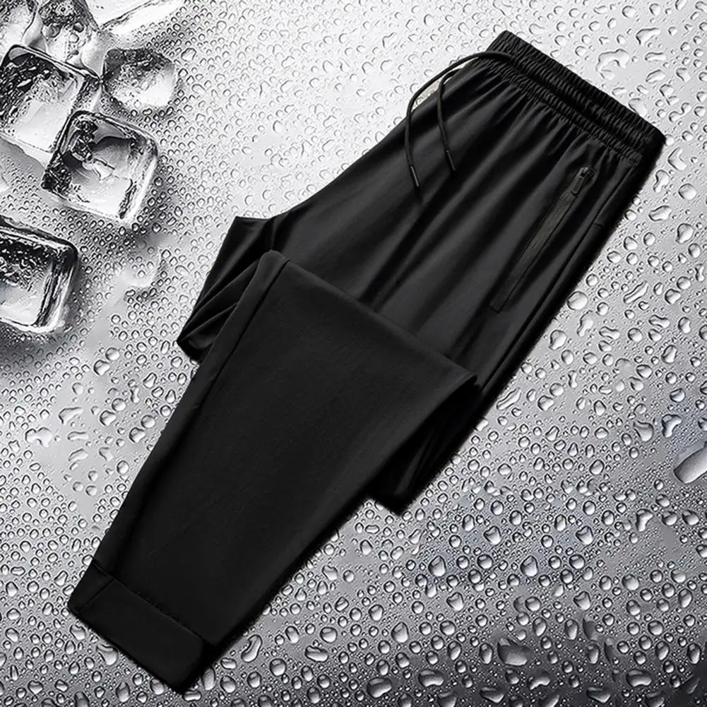 

Мужские быстросохнущие спортивные брюки из вискозы с усиленными карманами и широкими боковыми карманами для тренировок в тренажерном зале бега эластичные