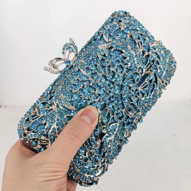 A cocktail in her hand and confetti in her hair. | Teal purse, Purse  outfit, Bags