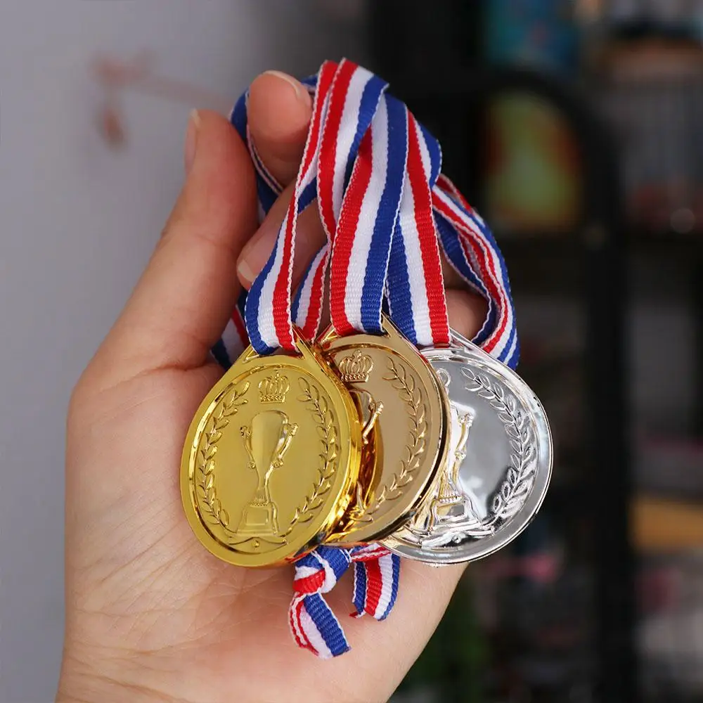 Award medals winner gold silver bronze dancing sports children running swimming plastic