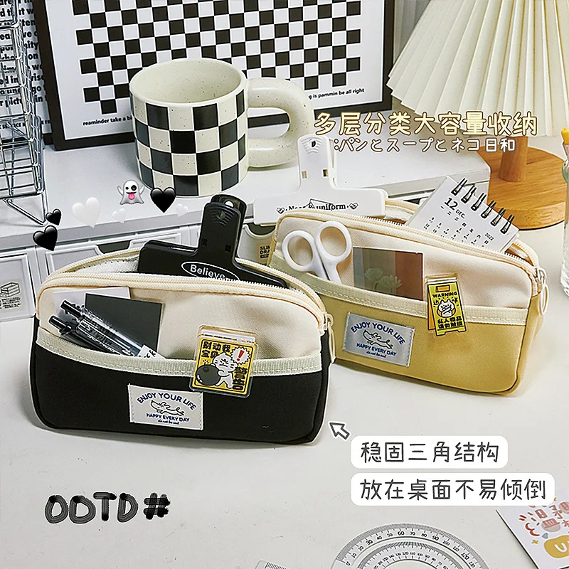 

The Opening Season of The New Pen Bag Oxford Cloth Large Capacity, Simple Triangle Multi -function Boys, Girls, Pencil Bag