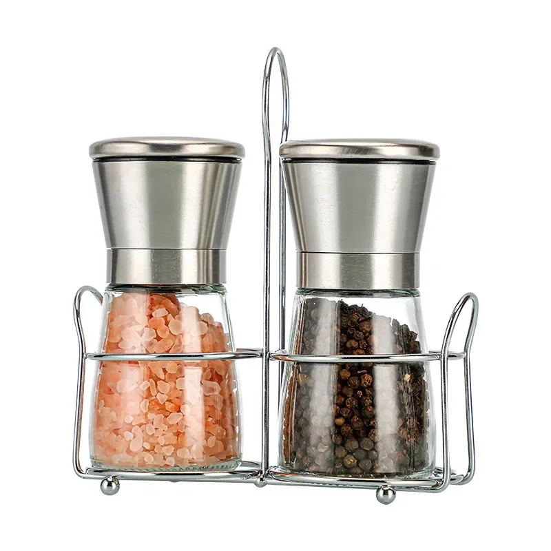 Kitchen supplies, manual grinder, pepper, Sichuan peppercorns, coarse salt, cumin, sesame seeds, and other sprinkling bottles
