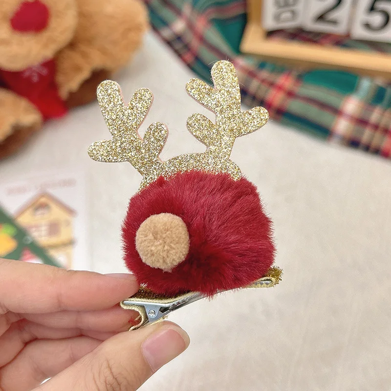 Burgundy pom pom antler clip