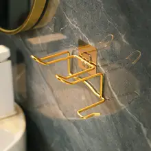 

Punch-free Hair Dryer Hanger Rack Light Luxury Bathroom Wall Hanging Shelf Self-Adhesive Hair Dryer Rack Toilet Placement Rack