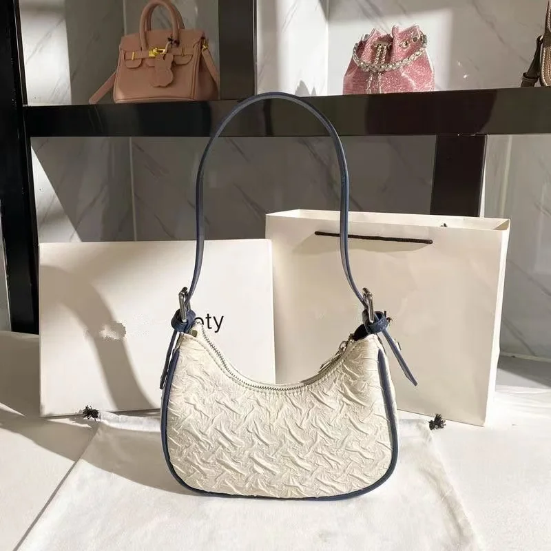 

Textured Elegance Shoulder Bag Sleek Design Cream Color Blue Accents Spacious Interior Durable Everyday Zip Top Secure Fashion V