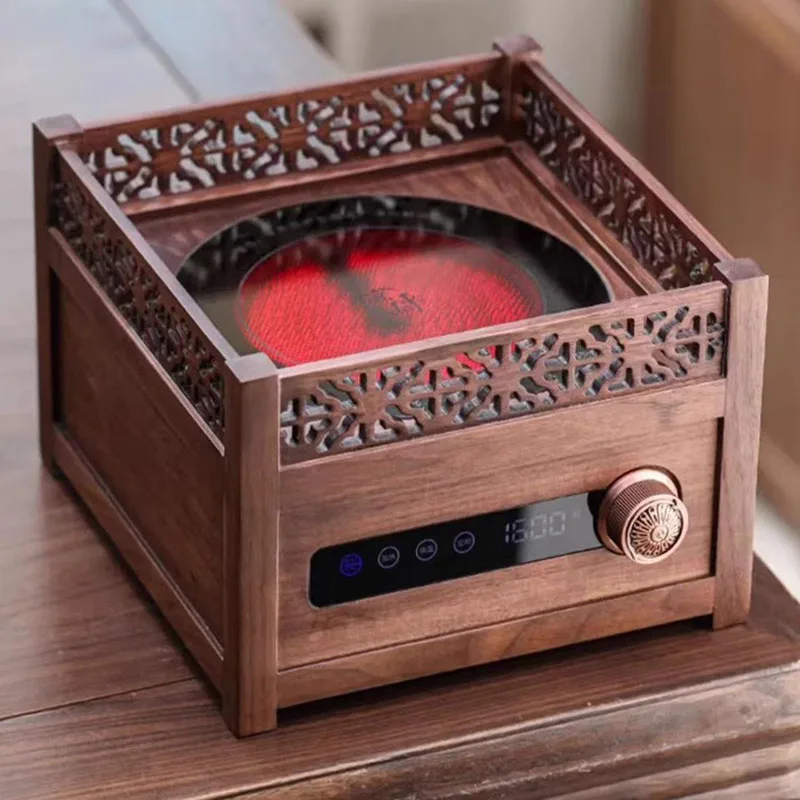 Making tea around the stove walnut wood electric ceramic stove tea boiler boiling water boiling teapot