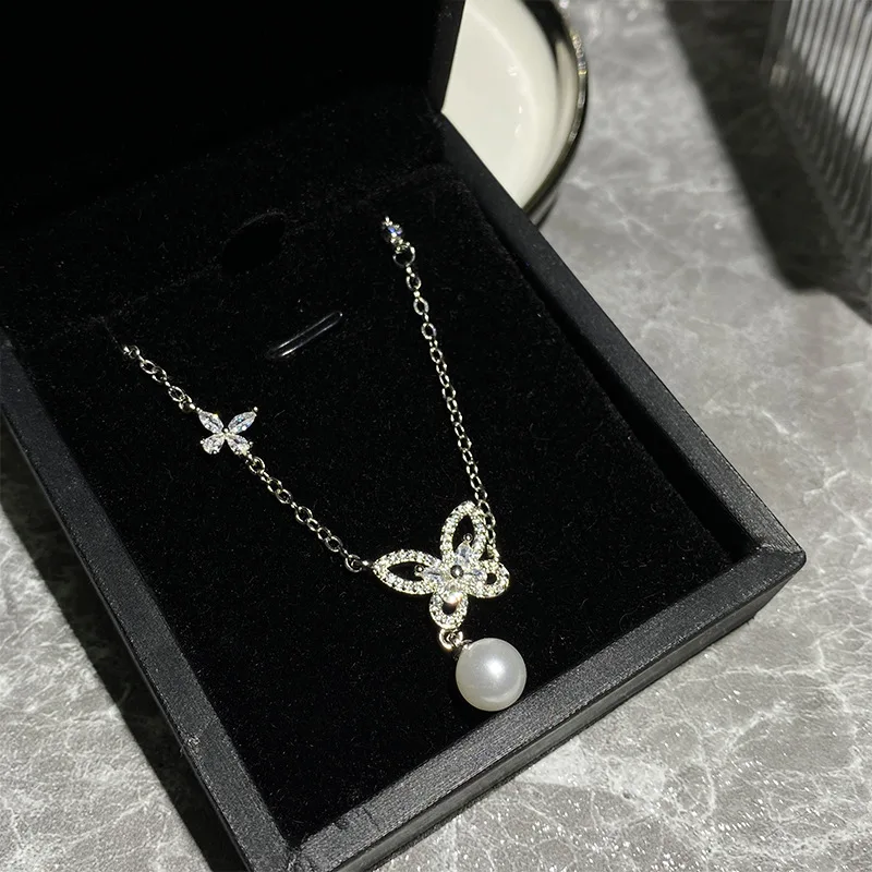 2023 Women Brilliant Bow Tie Earrings Plated 18K Gold Exquisite Water Drops Exaggerate Necklace Ring 6