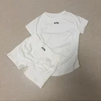 Ensemble de sport 2 pièces pour femme : T-shirt sculptant à manches courtes sans couture et short de sport pour le yoga, le fitness, l'entraînement et la course 4