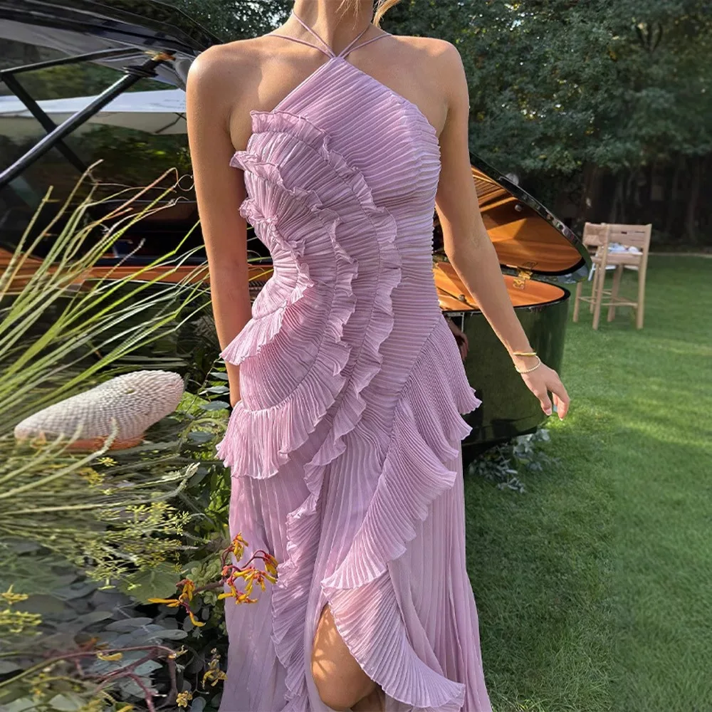 الملابس النسائية الأوروبية والأمريكية 2025 موضة صيف جديدة بدون حمالات فستان مثير بدون ظهر بشق شرابة