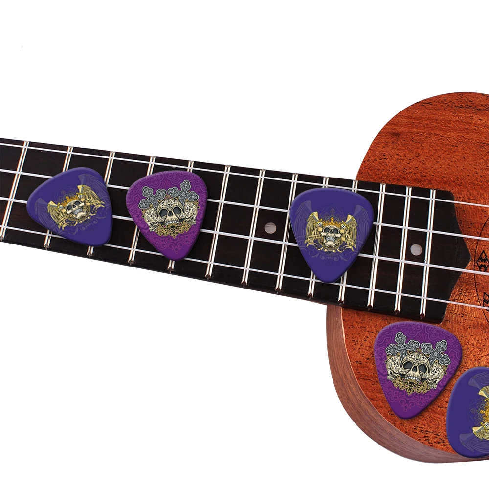 Guitar Picks 10Pcs/lot 0.71 0.46 1.0mm Thickness Cartoon Golden Skull Pattern Guitar Paddles Parts Accessories