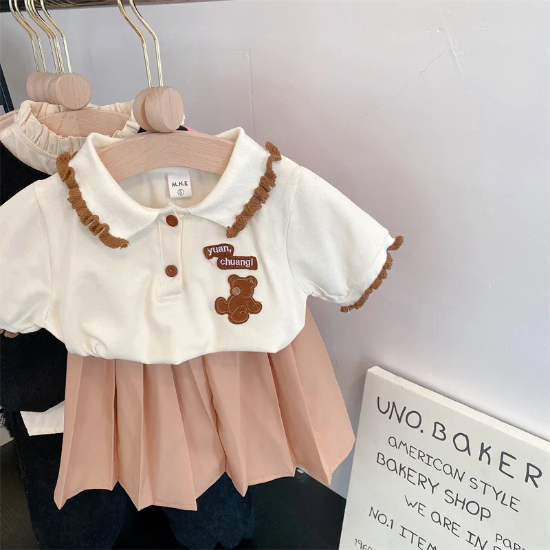 

Korean Summer Children Girl 2PCS Clothes Set Turn Down Collar Cartoon Bear Print T Shirt Solid Color Skirt Suit Kid Girl Outfits