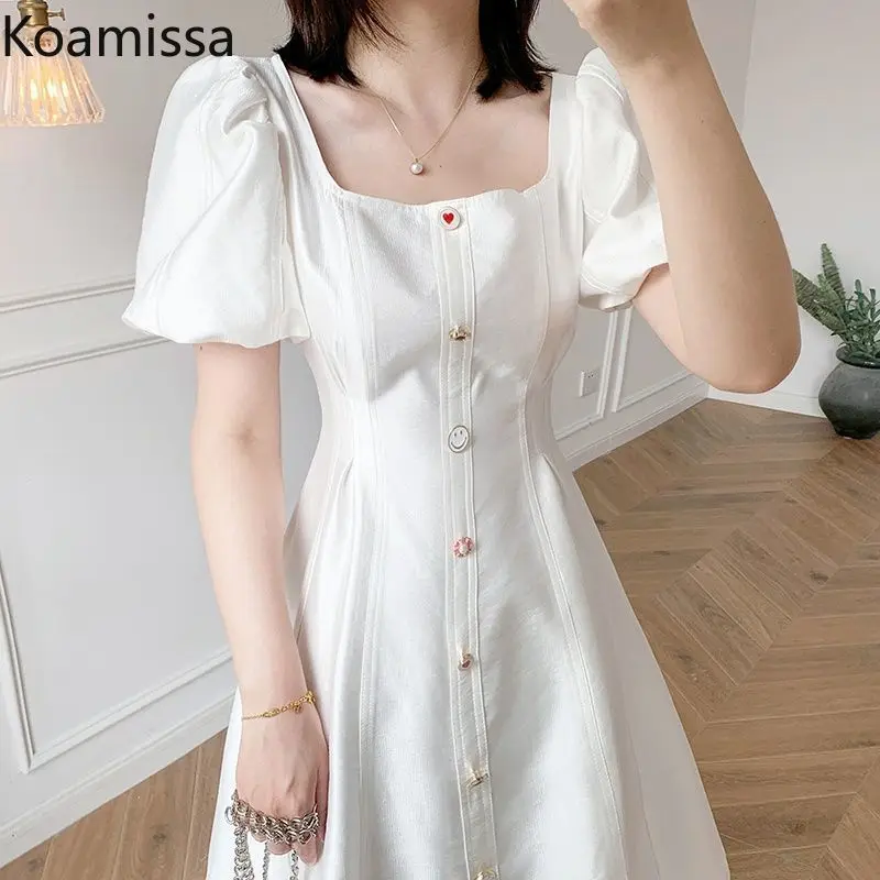 

Koamissa Smiple Women White Dress Puff Sleeves 2022 New Summer Lady French Single Breasted Dresses Korean Slim A Line Vestidos