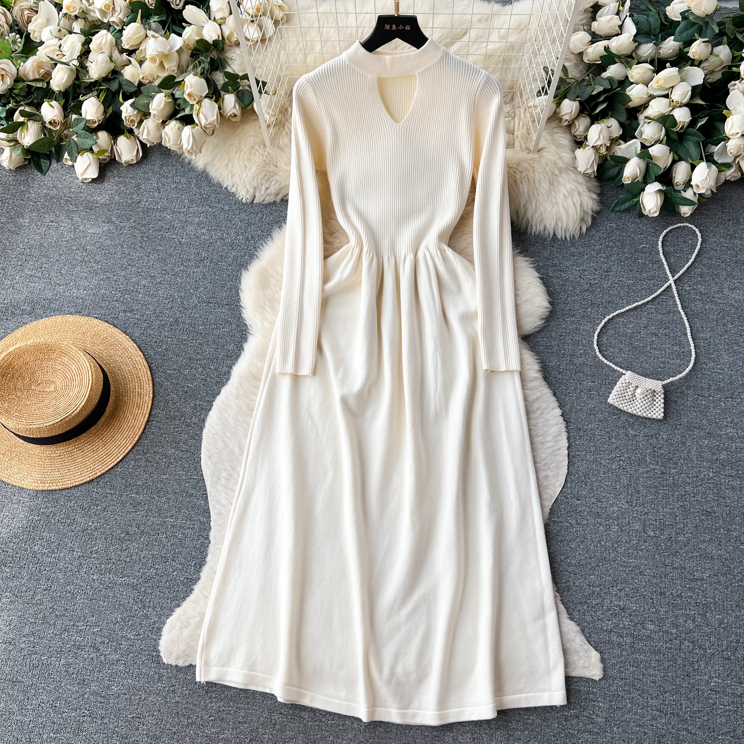 

2023 Spring and Autumn New Product Hollow out Round Neck Long Sleeve Knitted Dress for Women, Mid length High Waist Woolen Dress