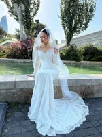 Flavinke فساتين زفاف بحورية البحر بيضاء لامعة مخصصة بأكمام طويلة على شكل قلب مزينة بالدانتيل فيستدو دي نوفيا 2