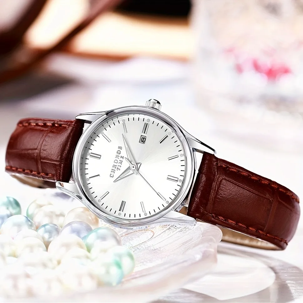 ساعة كرونوس النسائية الأنيقة بحزام جلدي وتقويم كوا...