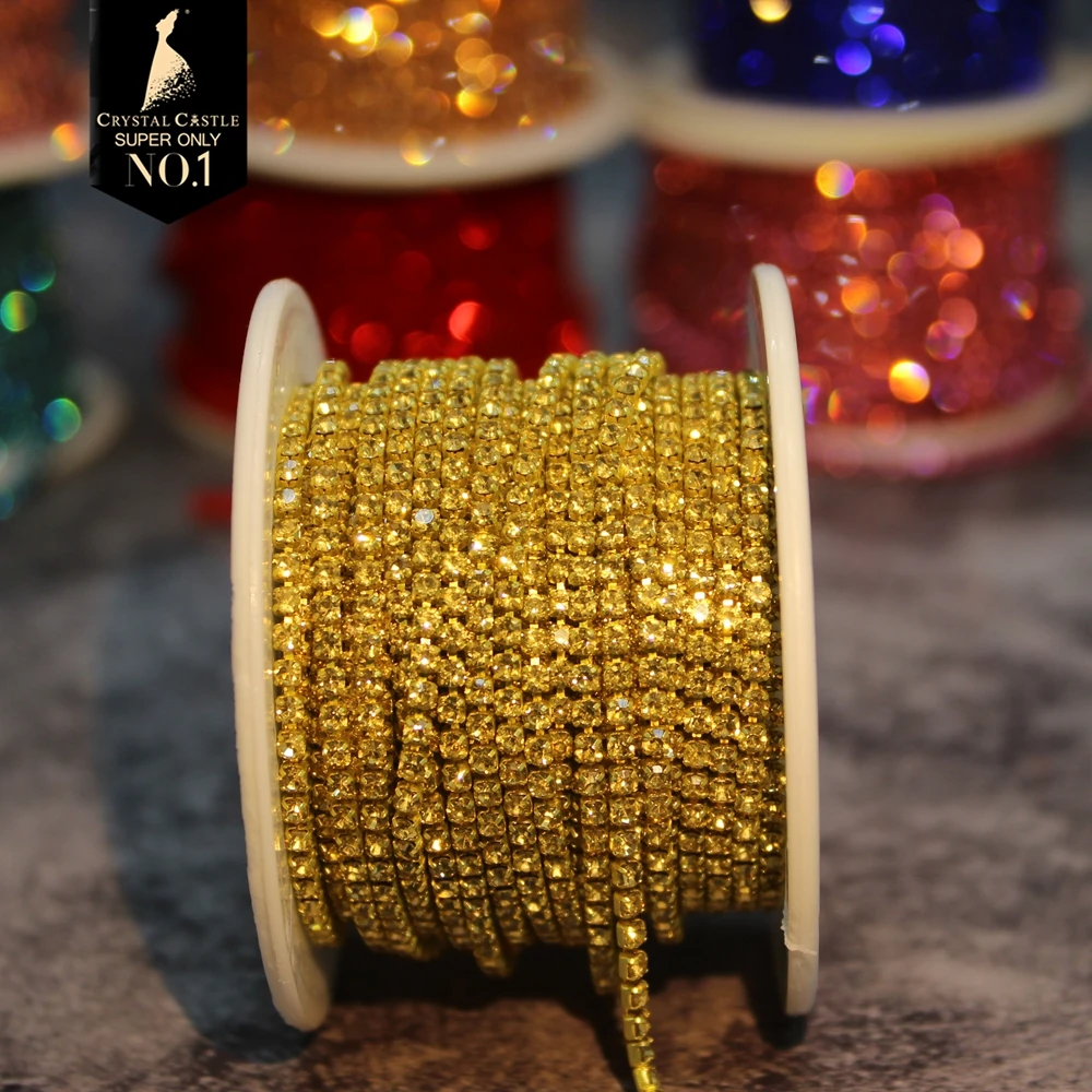 Gold Rhinestone Tassel Chain Roll with Crystal Ribbon Trim