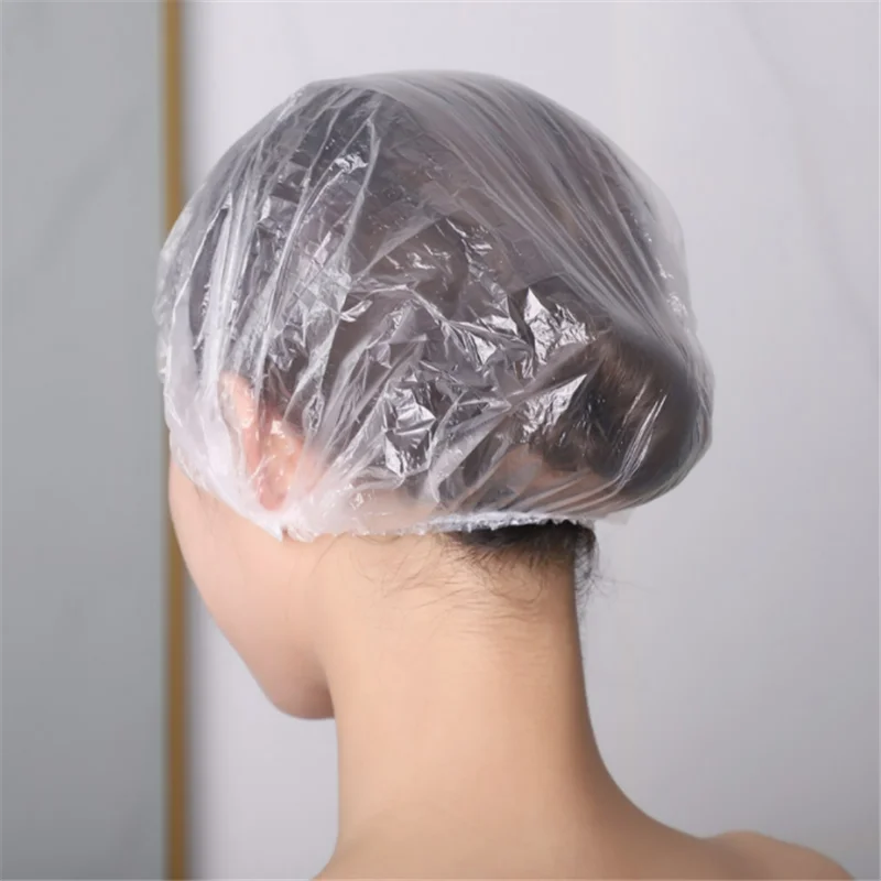 100 Pcs Disposable Shower Cap Plastic Waterproof Headgear Hotel Hair Dye Shower Cap Transparent Plastic Beauty Salon Cling shower cap disposable hair cap hair dye cap