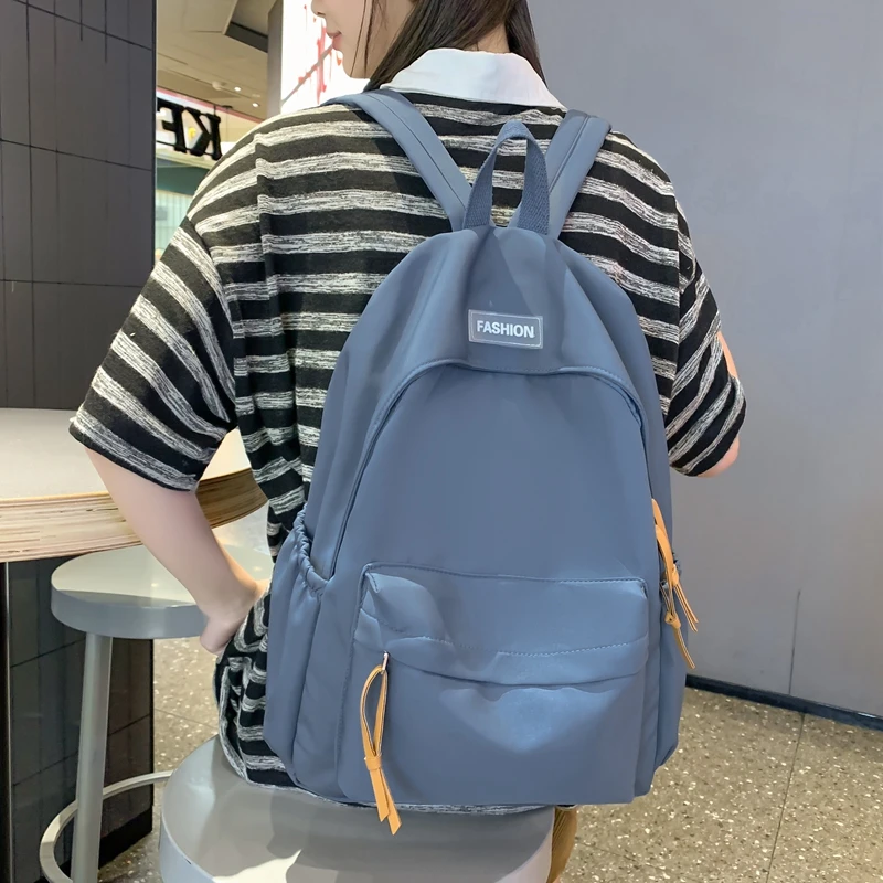 2023 New Backpack Womens Bag Version Versatile Canvas Book Bag Leisure  Simple Travel Bag Fashion One Shoulder Backpack 50% Clearance Sale From  Necklace_co, $26.87