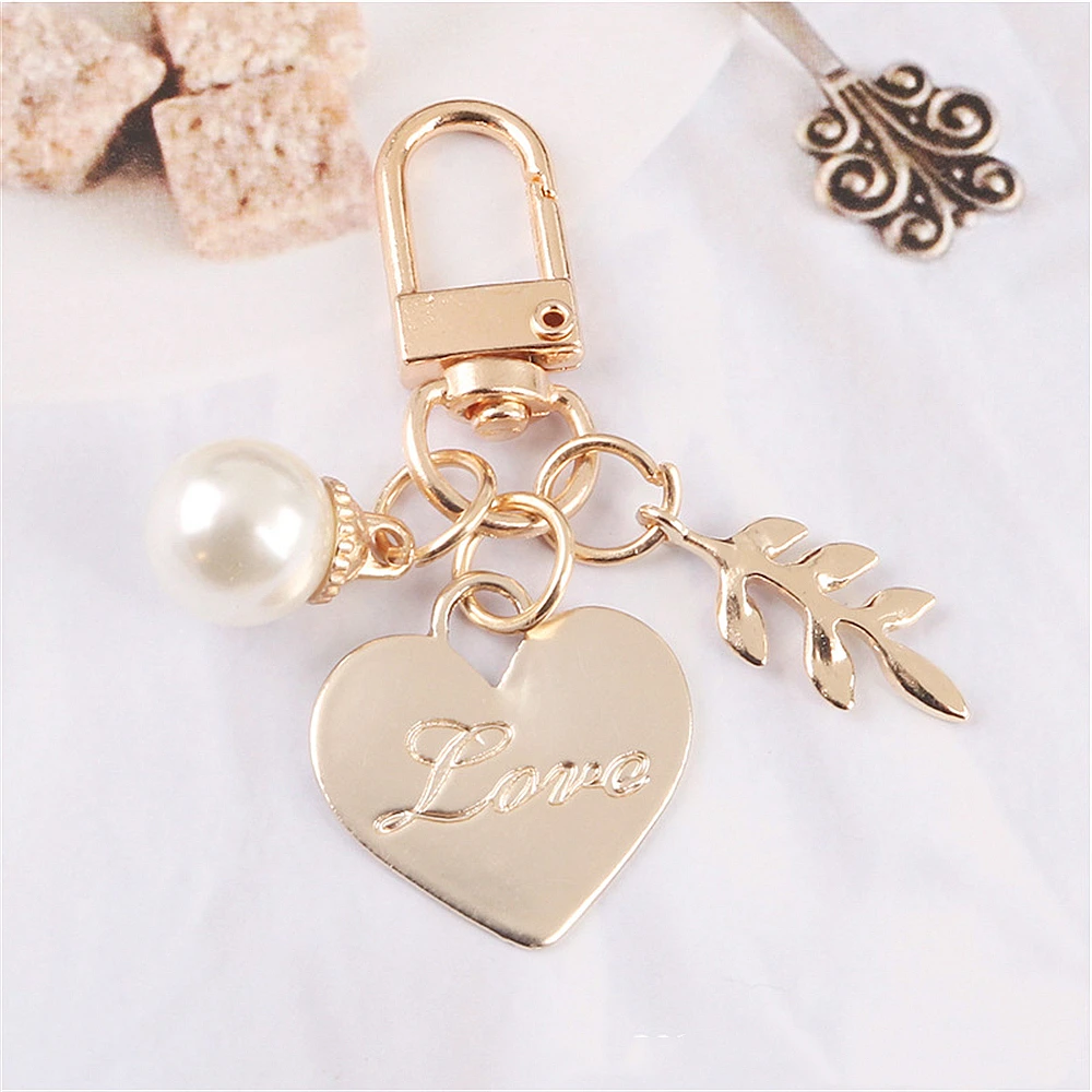 LIANGLIN WU Key Chain for Women and Men, 4 Pcs Cute Love Letter Shell Conch  Pearl Metal Golden Keychain Kit Girls Bag Charm Car Keyring Fashion