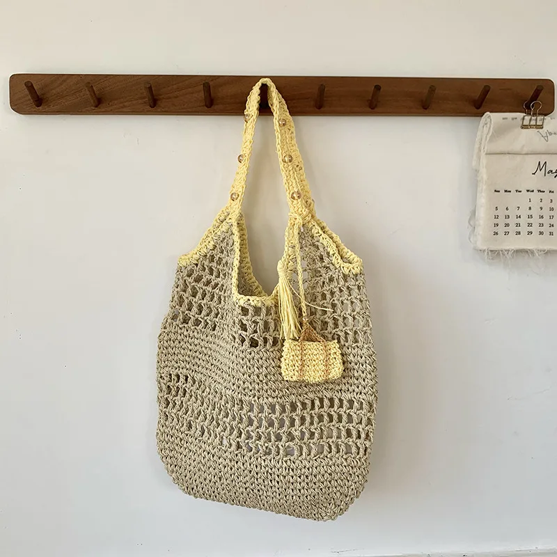 Spring Summer Hollow Woven Handbag Women's Pure Handmade Paper Rope Net Beach Vacation Straw Woven Bag Niche Single Shoulder Bag