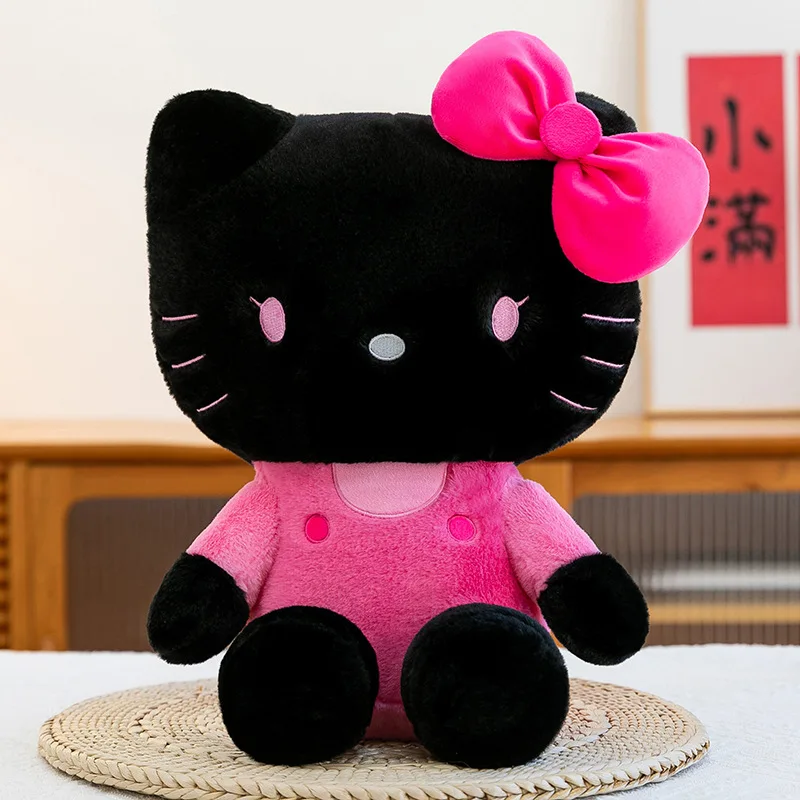 دمية محشوة هلو كيتي (Hello Kitty) باللون الأسود وا...