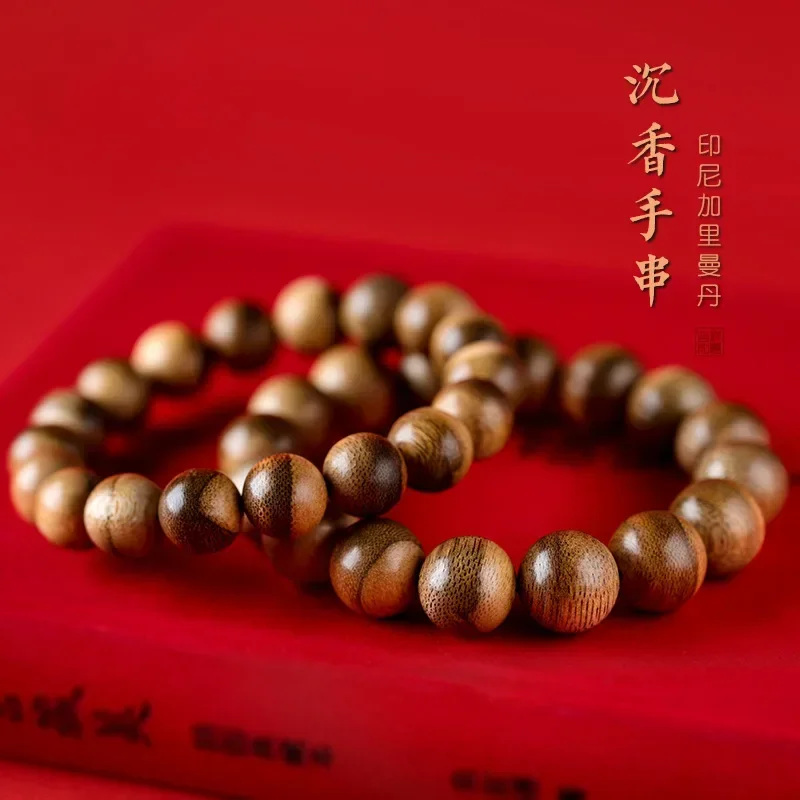 

Kalimantan aloes hand string authentic old material men women Buddhist beads wooden text play aloes single ring bracelet luxury