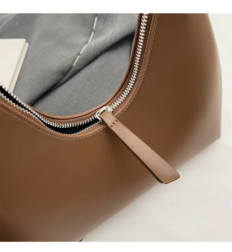 Sotto le ascelle da donna 2024 nuovo modello minimalista a mezzaluna con temperamento versatile, viaggio casual, consistenza portatile,_voghion.com