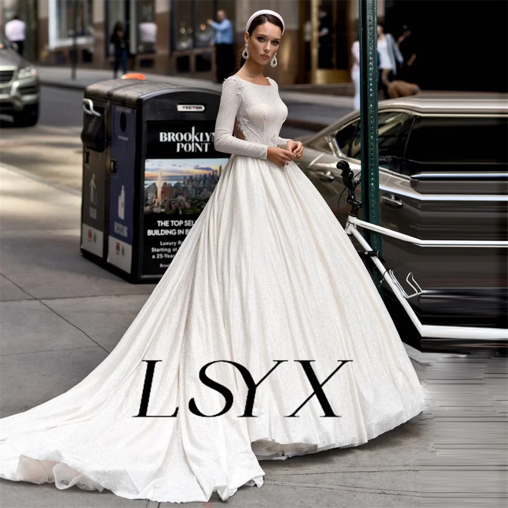 Фото Блестящее свадебное платье LSYX принцессы с круглым вырезом, длинными рукавами, аппликациями, пуговицами, бантом на спине, трапециевидной формы, со шлейфом, свадебное платье №3