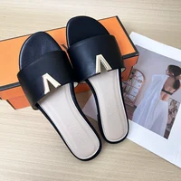 2024 summer new V-shaped metal decoration flat bottomed beach women's fashionable slippers - Image 4