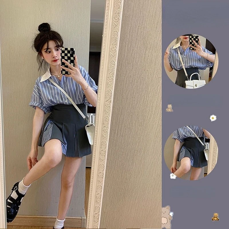 

Hong Kong style suit female 2023 summer new design sense striped splicing shirt temperament pleated half-body skirt two-piece