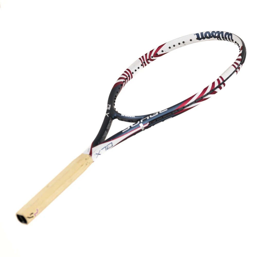 

Теннисная ракетка CARBON Wilsons BLX 100 SURGE 2 #4 1/4 100 кв. дюйма 0032573