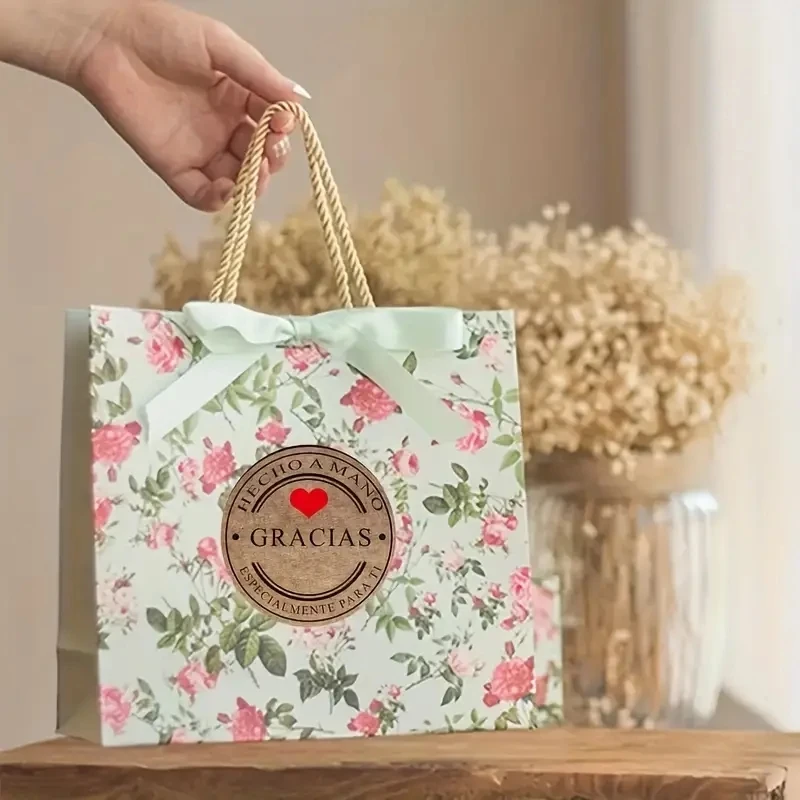 Close-up of Gracias stickers displayed on a desk for crafting use