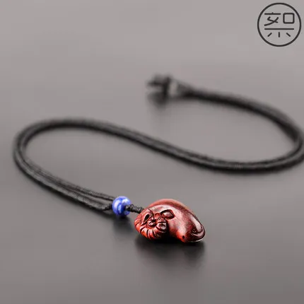 

Delicate Small Leaf Rosewood Sheep Head Pendant