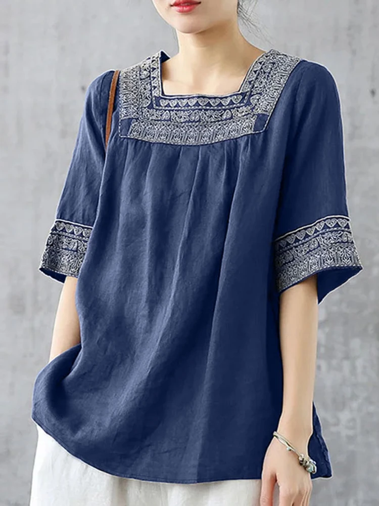 Eugenia® | Half-sleeved blouse with a round neckline and pearl detail