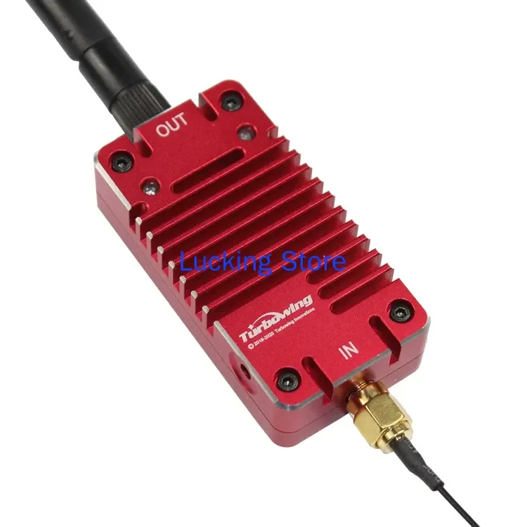 Amplificateur de signal télécommande 2.4G 4W avec antenne, posé sur fond blanc