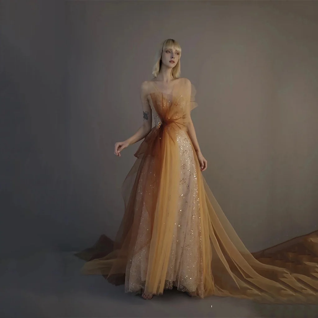 

Champagne Yellow Evening Dresses Sleeveless Train Sequined Tiered Beading Backless A Line Ruffle Luxury Formal Party Prom Gowns