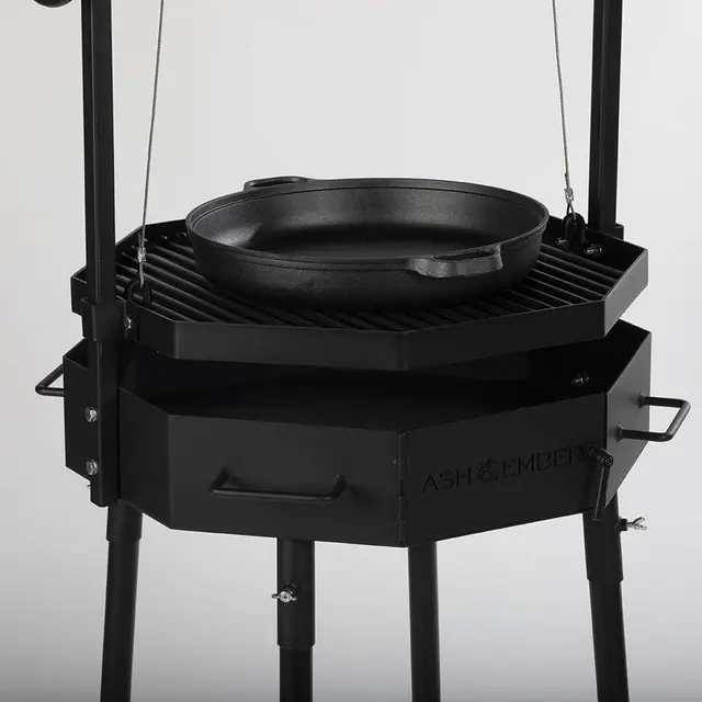 Argentine-Inspired Santa Maria Fire Grill by Titan Great Outdoors, featuring Adjustable Grate, Cast Iron Skillet, and Flywheel C 3