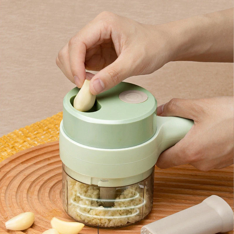 https://ae01.alicdn.com/kf/S9b4e70bee5e9433299b6daa72435cf83o/4-In-1-Handheld-Electric-Vegetable-Cutter-Set-Mini-Wireless-Mud-Artifact-Garlic-Crusher-Mixer-Food.jpg