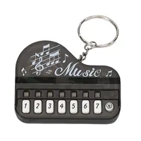 Fashion Electronic Finger Piano Keychain Toy Portable Musical Instrument Toy Piano Keychain for Key Backpack Hanging Decoration 1