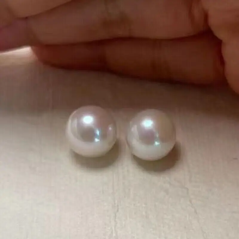 

A pair 7.5mm south sea white round loose pearl half drilled