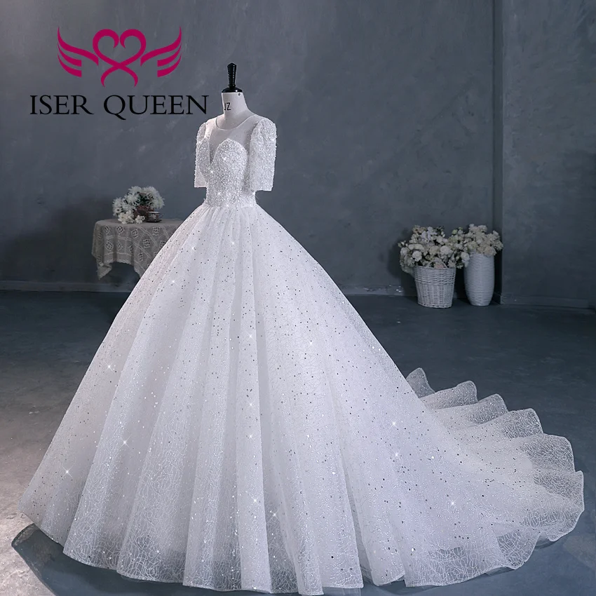 Customized hollow Back Sequin Tulle Luxury Wedding Dresses 2026 Chapel Train Short Sleeves Ivory Champagne Bride Dress WX0293
