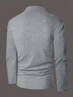 Un polo élégant à col rond pour hommes, uni épissé, adapté à porter à la maison en été, automne et hiver 2