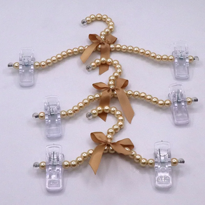 

2Pcs/Lot Baby Hangers For Clothes Kids Pet Pearl Plastic Hanger Child Clothes Rack Pet Dog Mini Hangers Wardrobe Baby Coat Rack