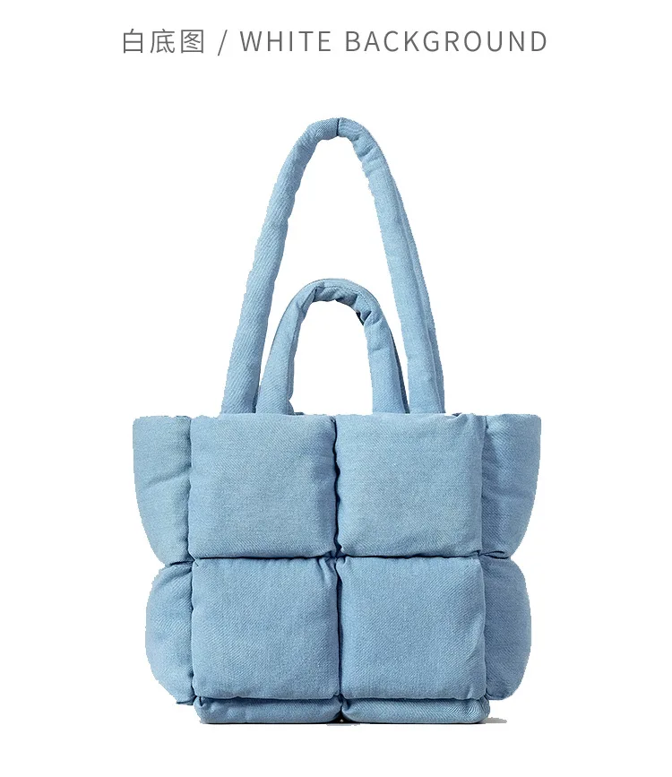 Quilted denim puffer handbag on chair