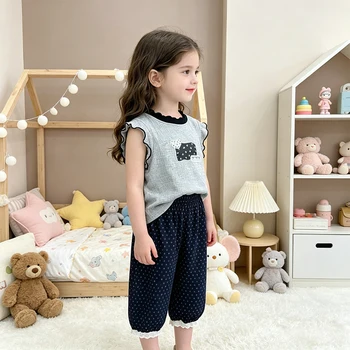 Completo da bambina in 2 pezzi, top senza maniche con volant, pantaloni corti in pizzo a pois, set di vestiti casual estivi per bambini