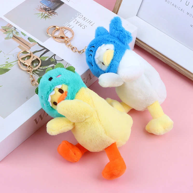 

1PC Creative Backpack Boys And Girls Doll Bag Pendant Fashione Doll The New Series Of Funny Head Duck Stuffed Toy Car key Chain