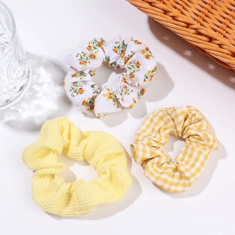 Accessoires capillaires élastiques à motif floral