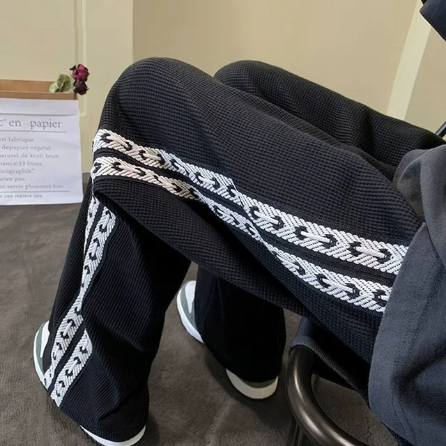 Pantalones informales con estampado de retales para hombre, pantalón holgado de pierna ancha, liso, con bolsillos, estilo americano, a la moda, para otoño