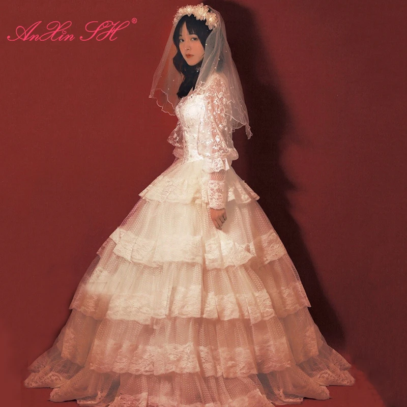 

AnXin SH vintage white flower lace princess handmade high neck illusion long puff sleeve ruffles bride Antique wedding dress