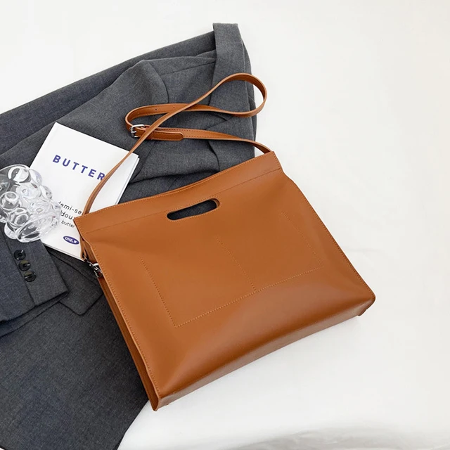 حقيبة كمبيوتر محمول عصرية بتصميم فاخر للمرأة اسم م...